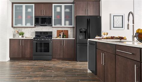 what color cabinets with black stainless steel appliances|brown kitchen cabinets black appliances.